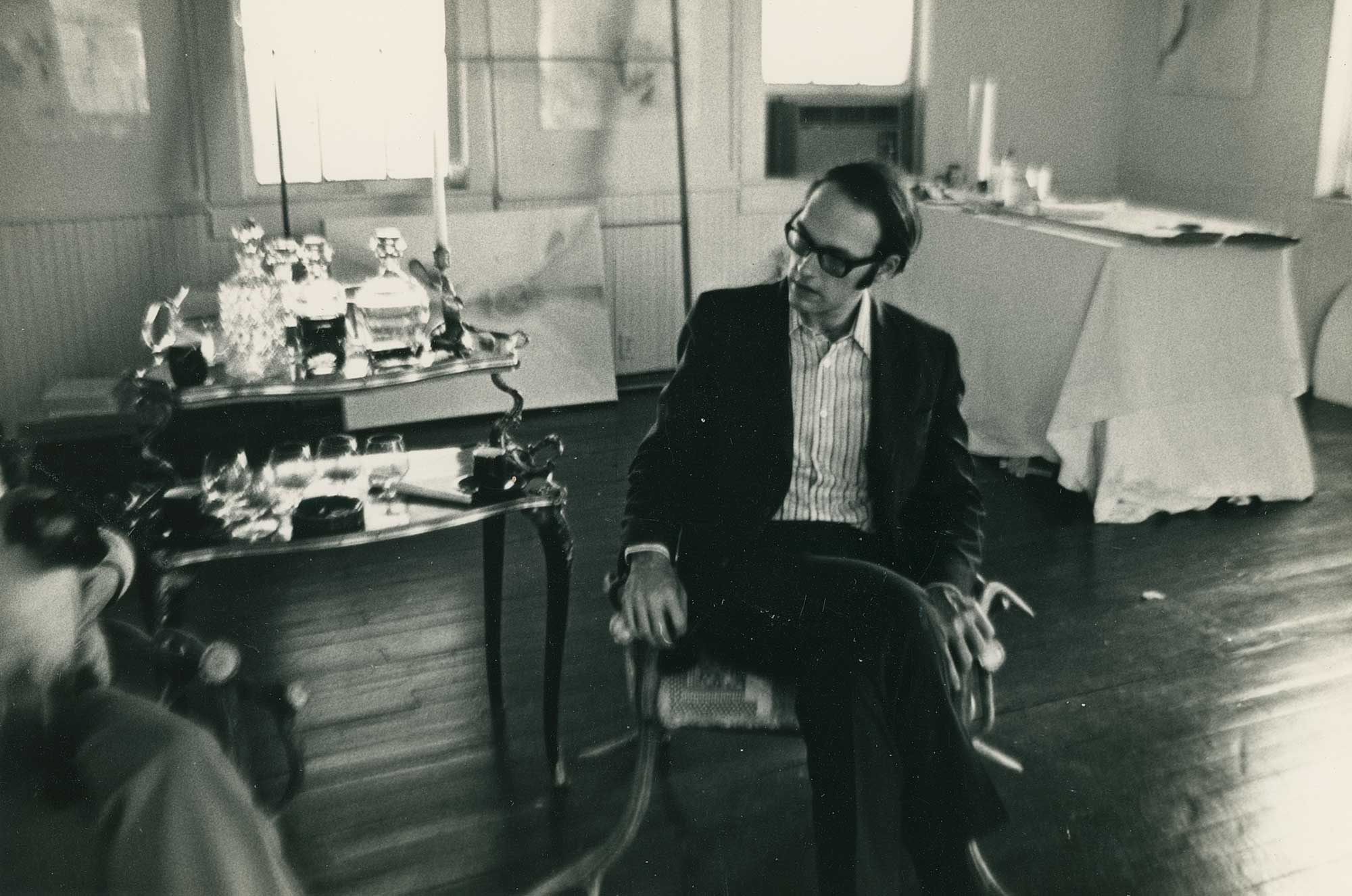 Jerry Hunt seated in Salle Werner's studio.