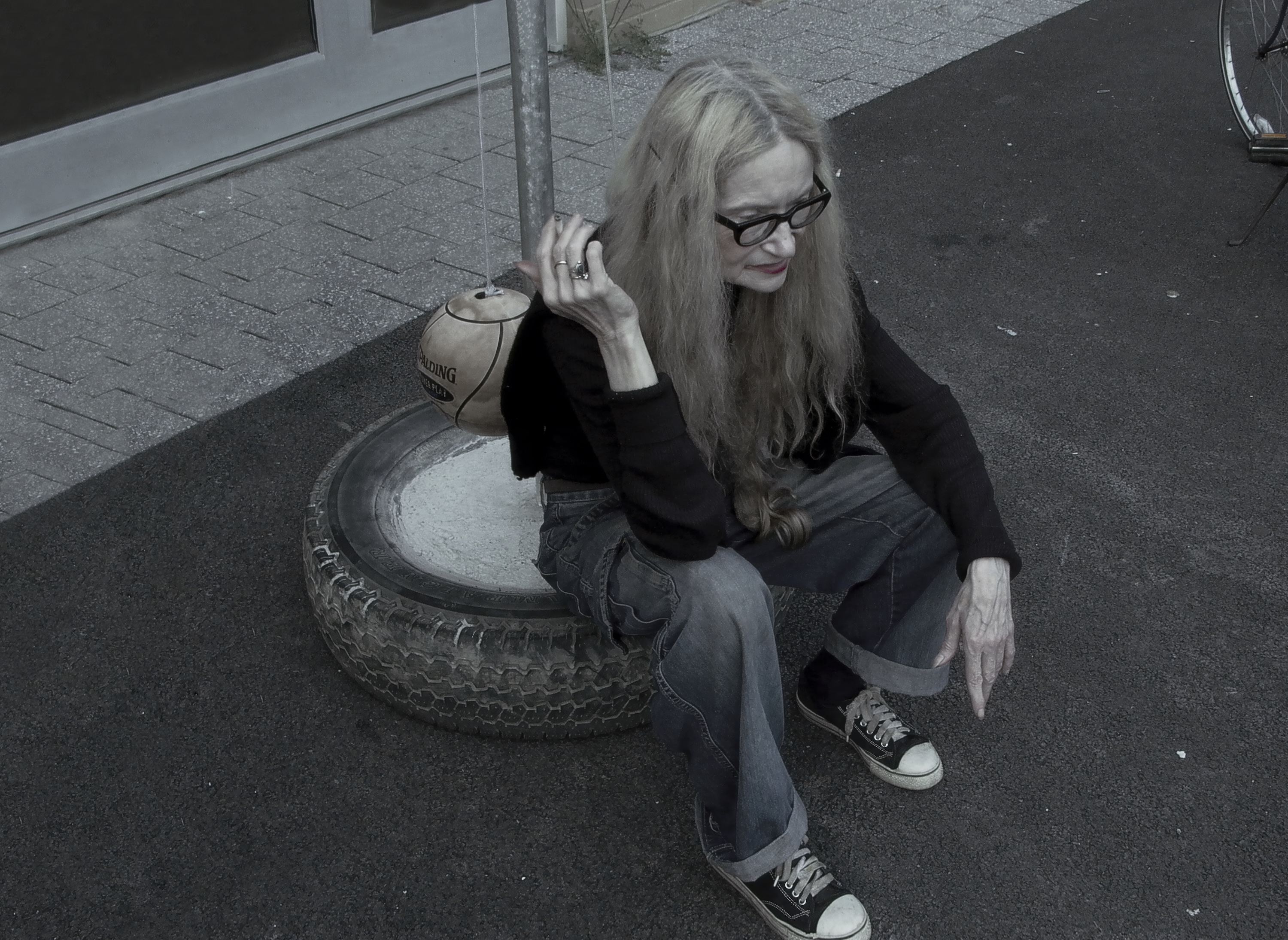 Maryanne Amacher sitting and smoking