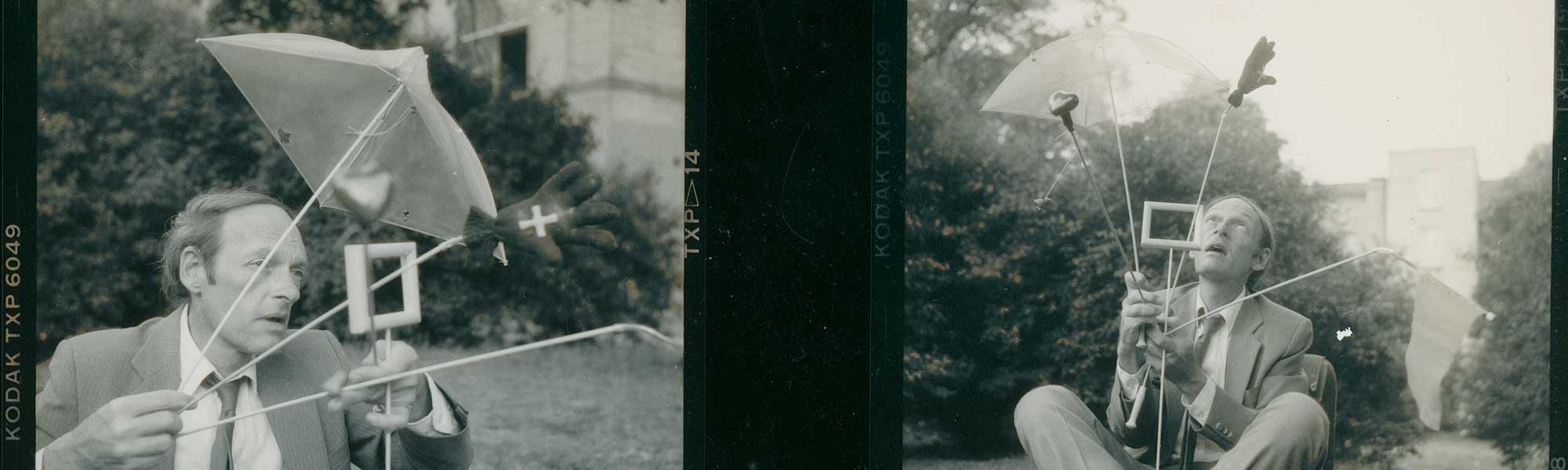 Jerry Hunt seated outside with his wands, 1976.